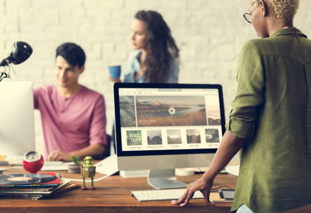 Professional video editing and timeline management for Social Media Marketing in Durango, CO, in a collaborative office setting.
