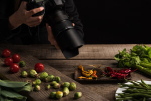 Professional social media photography of restaurant food being captured by a photographer